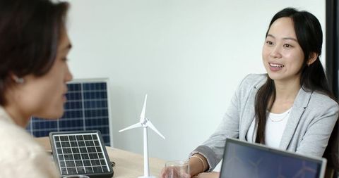 Asian Women Collaborating on Renewable Energy Solutions