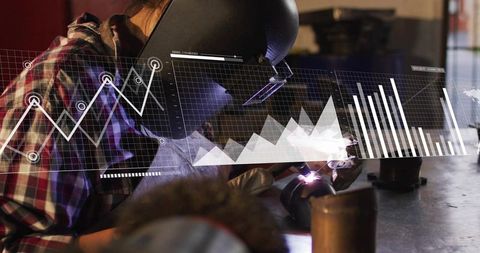 Female Welder Fabricating Metal with TIG Torch and Smart Data Overlay for Industry