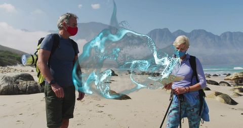 Mature Couple with Digital Swirl on Scenic Coastal Hike