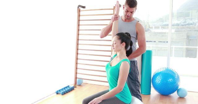 Physiotherapist Working with Female Patient on Stretching Exercise - Download Free Stock Images Pikwizard.com