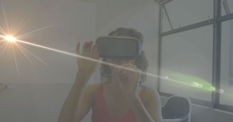 Woman Experiencing Virtual Reality with Interactive Light Effects