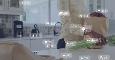 Woman unpacking groceries on sunlit kitchen island with augmented reality social overlays