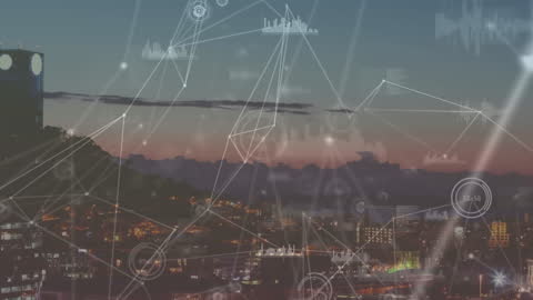 Digital Data Networks Over City at Dusk