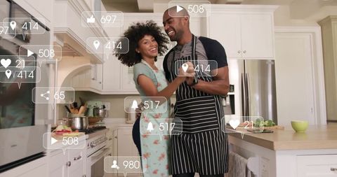 Romantic Couple Dancing in Kitchen Wtih Social Media Overlay