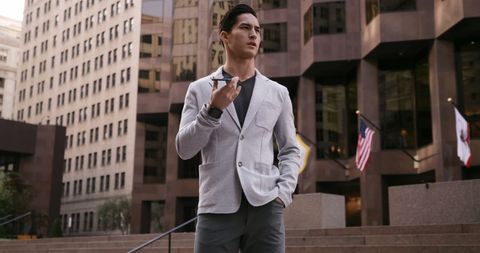 Confident Young Businessman in Urban Corporate Environment