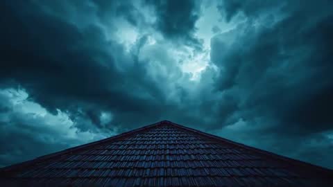 Dark Storm Clouds Hovering Above Tiled Roof