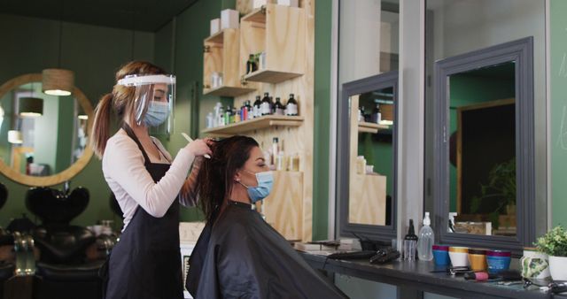 Hairdresser Wearing Face Shield and Client with Mask in Modern Salon - Download Free Stock Images Pikwizard.com