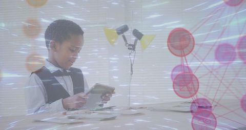 Innovative learning concept: child engaging with technology displays
