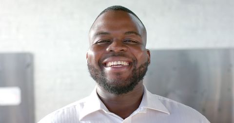 Smiling african american businessman in office