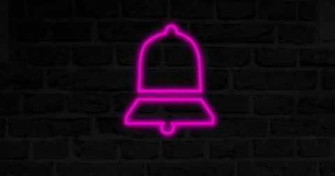 Neon Pink Bell Glowing Against Dark Brick Background