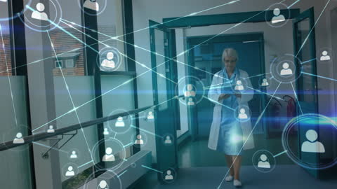 Doctor Engaging with Digital Network in Hospital Corridor