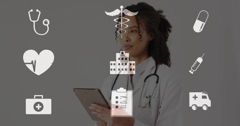 Female Doctor Utilizing Technology Surrounded by Medical Icons