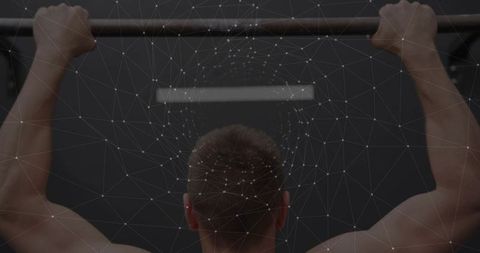 Pulling up athlete gripping bar with digital network overlay conveying strength and focus