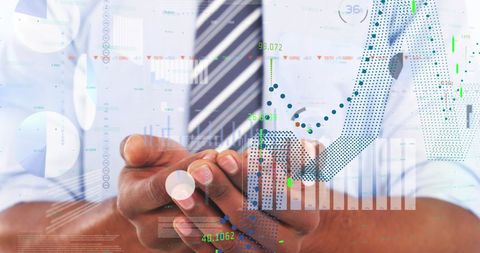Businessman with Financial Data Graph Overlay Showing Rising Growth