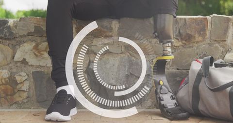 Male Athlete with Prosthetic Leg Using Smartphone Outdoors - Download Free Stock Images Pikwizard.com