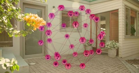 Projecting pink hexagonal health network over modern home patio in augmented reality