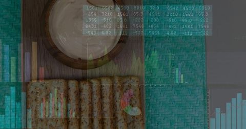 Top-down creamy dip and seeded crackers on board over teal placemat with data overlay