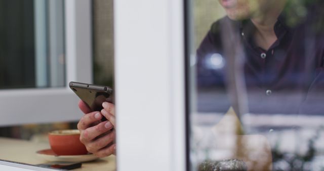 Man Texting While Having Coffee Indoors - Download Free Stock Images Pikwizard.com