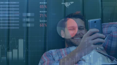 Man Analyzing Business Data on Smartphone Overlaid with Graphs