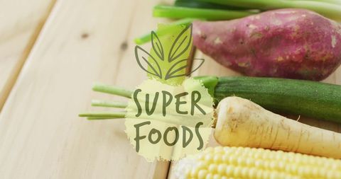 Fresh Organic Vegetables with Superfoods Text Overlay on Wood