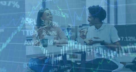 Coworkers Discussing Stocks in Modern Corporate Break Room