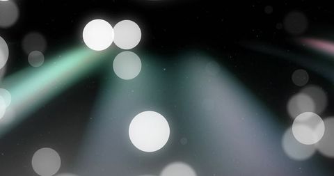 Glowing White Bokeh Orbs Casting Teal and Lavender Light Beams