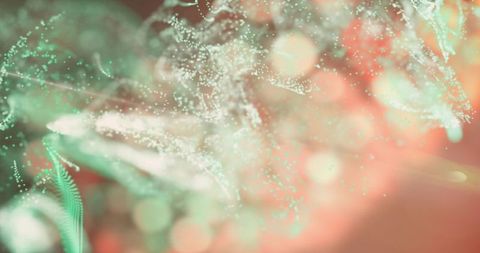 Ethereal teal particle filaments drifting over coral bokeh gradient with glowing depth