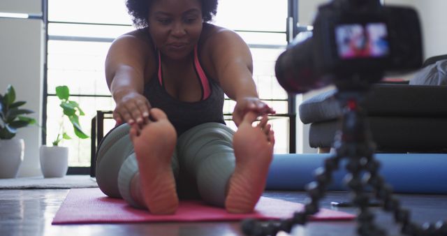 African American Woman Stretching During Online Yoga Class at Home - Download Free Stock Images Pikwizard.com