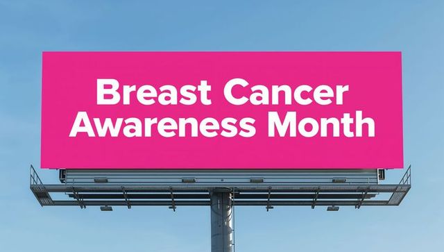 Pink billboard advocating breast cancer awareness month