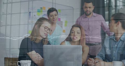 Diverse Business Team Collaborates with Digital Interface Overlay