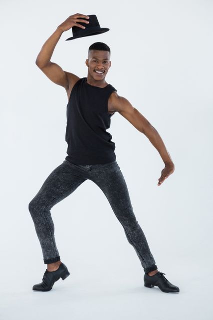 Male Dancer Practising in Studio with Hat - Download Free Stock Photos Pikwizard.com