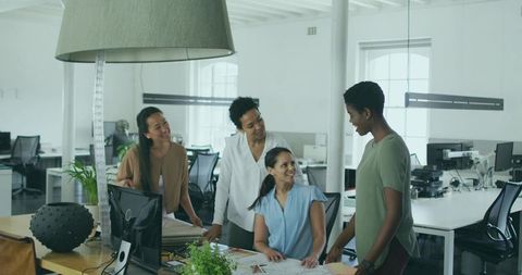 Women team discussing office plans with enthusiastic collaboration