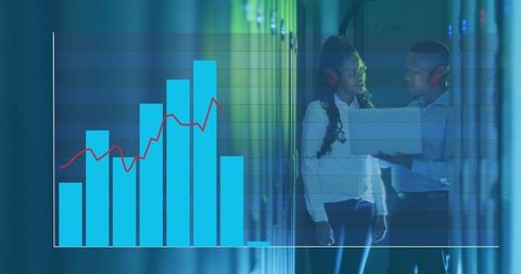 IT Professionals Analyzing Server Performance in Data Center