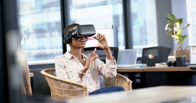 Woman Wearing Virtual Reality Headset in Modern Office - Download Free Stock Images Pikwizard.com