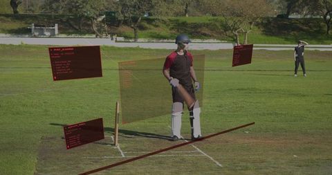 Cricket batter standing at wicket wearing helmet and pads holding bat with ar analytics