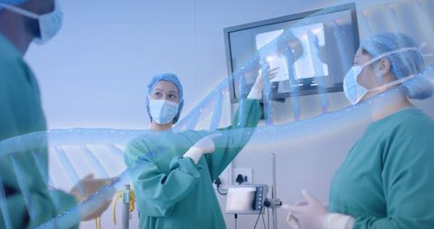 Healthcare Team Reviewing Patient Data on Screen in Clinical Setting