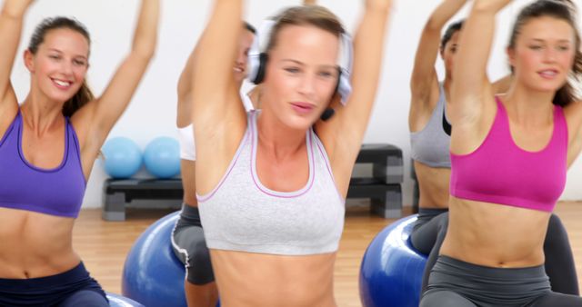 Women Enjoying Energetic Aerobics Exercise in Fitness Class - Download Free Stock Images Pikwizard.com