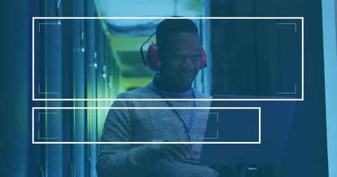 Technician in datacenter managing server operations