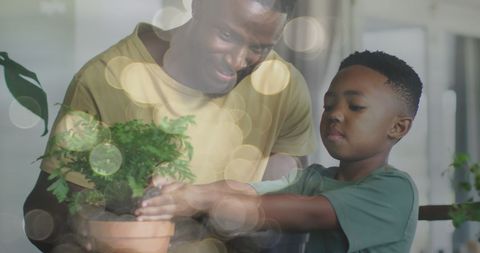 Father and son bonding over houseplant care