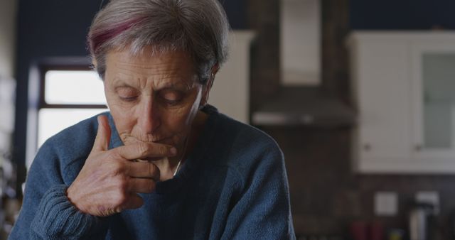 Contemplative Senior Woman Deep in Thought at Home - Download Free Stock Images Pikwizard.com