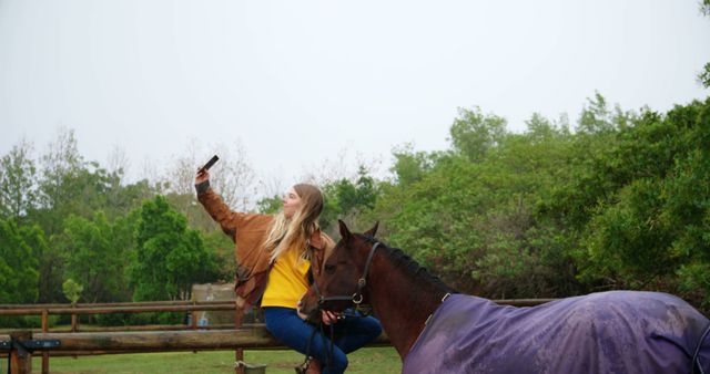 Young Woman Taking Selfie with Horse in Green Pasture - Download Free Stock Images Pikwizard.com
