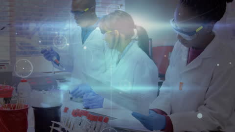 Diverse Scientists Analyzing Data in Laboratory