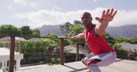 Active Biracial Man Practicing Yoga on Balcony with View - Download Free Stock Images Pikwizard.com