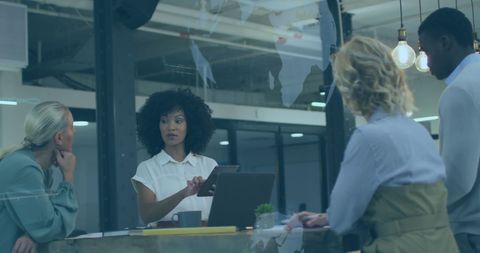 Business Team Collaborating with Global Data Concept Overlay