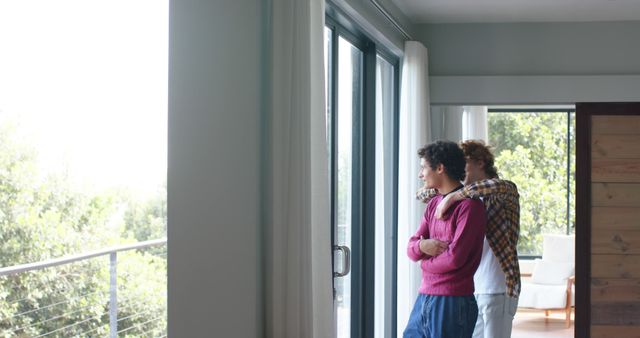 Happy Couple Relaxing at Home Looking Out Patio Doors - Download Free Stock Images Pikwizard.com