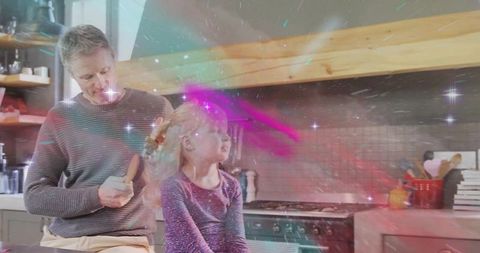 Dad brushing daughter hair in cozy modern kitchen with magical sparkles and warm bonding