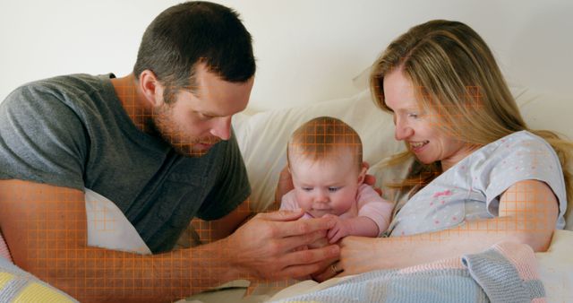 Loving Parents Spending Quality Time with Baby in Bed - Download Free Stock Images Pikwizard.com