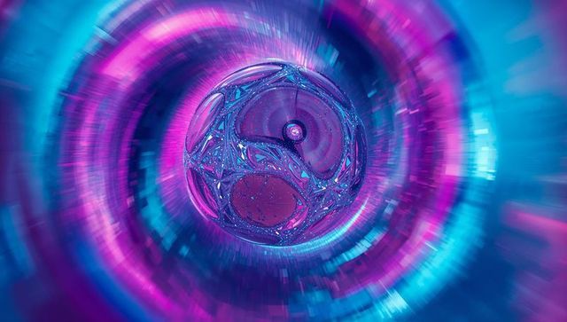 Futuristic Metallic Sphere in Neon Tunnel