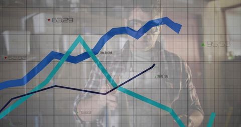 Businessman Analyzing Line Chart Data in Modern Office