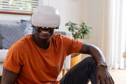 Man Enjoying VR Immersive Experience Comfortable Stylish Home